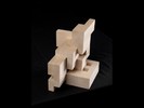 Photograph of bass wood cube model with shifted portions of the cube.