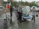 Transporting shelters in the rain.