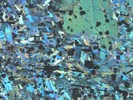 Sample MU-2H, view 2, under crossed polarized light.