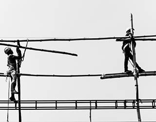 Workers on scaffolding.