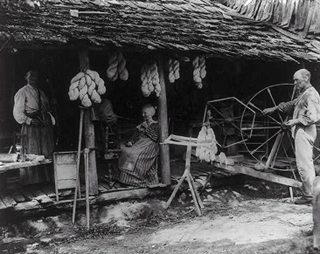 A photograph from 1910 that shows a family at work.