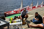 Three small video screens cabled to the ROV.