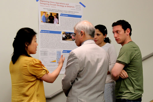 Students speaking with an invited guest.